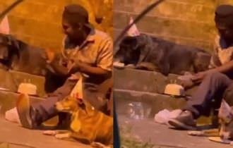 Emocionante: mendigo comemora aniversário com cachorros de rua e faz a internet chorar; veja vídeo