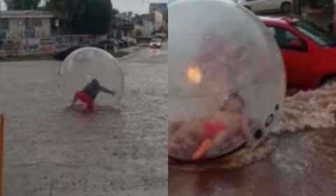 Homem dentro de bolha em inundação viraliza nas redes sociais; veja vídeos