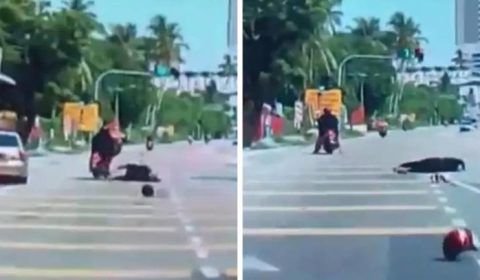 Vídeo: Mulher cai de moto após ser atingida por coco