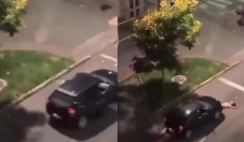 Vídeo: após briga com companheiro, mulher deita na rua e carro passa por cima; imagens fortes