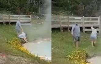 Visitante grita de dor após mergulhar a mão em fonte de água fervente em parque