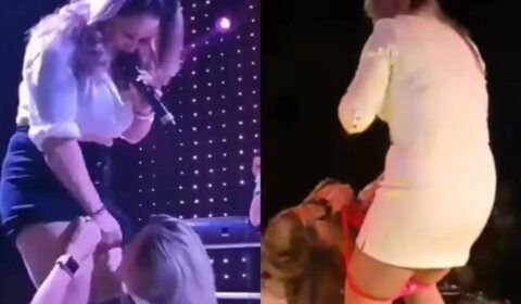 Urgente: cantora viraliza ao coar cachaça na calcinha para fãs no palco