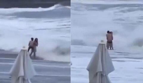 casal-e-derubado-por-ondas-na-russia