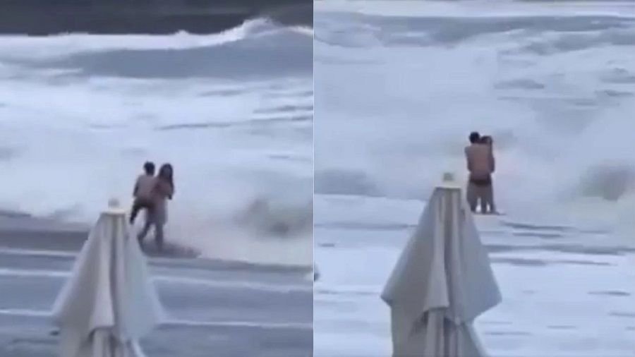 casal-e-derubado-por-ondas-na-russia